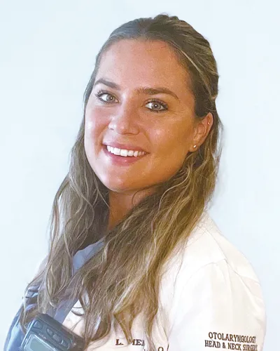 Headshot photo PCOM graduate and otolaryngology resident Lauren E. Melley, DO '21 (RES '26) wearing her physician white coat